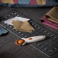 Fiskars 45mm Rotary Cutter for Fabric, Premium Steel Stick Fabric Cutter Cuts Through Multiple Layers, Right and Left Handed, Easy and Safe Blade Change, Arts and Crafts, Sewing and Quilting Tools Premium Stick 45mm Premium Steel Quick Blade Change SoftGrip Stick