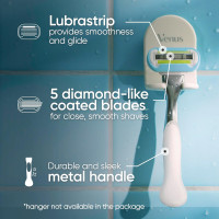 Gillette Venus Platinum Extra Smooth Metal Handle Women's Razor Handle + 4 Blade Refills, Pivoting Head and Ribbon of Moisture Platinum Handle + 4 Refills