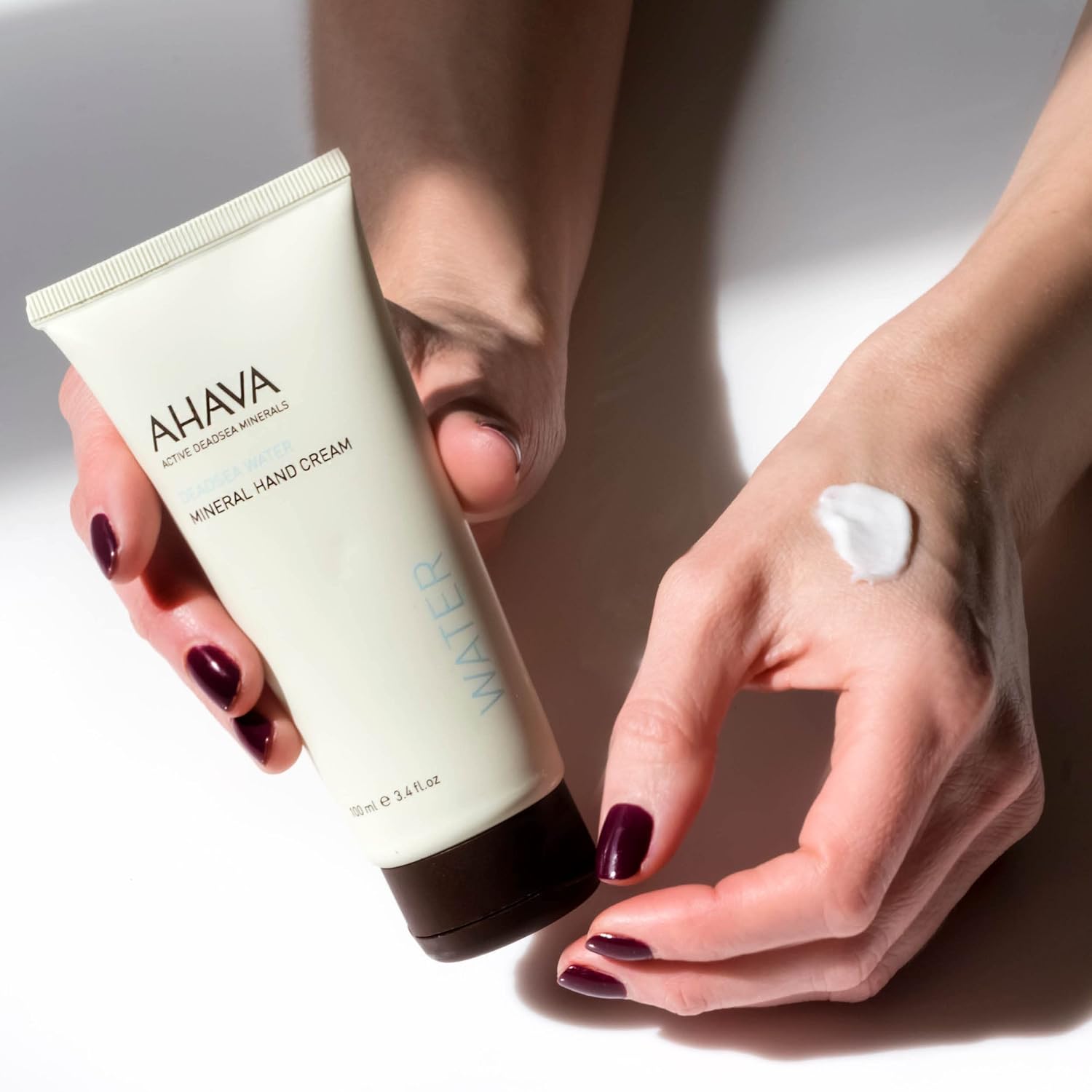AHAVA Dead Sea Water Mineral Hand Cream - Hand Moisturizer For Dry Cracked Hands, Light & Fast Absorbing, Enriched with Exclusive blend Osmoter, Smoothing Witch Hazel & Soothing Allantoin Original 3.4 Fl Oz (Pack of 1)