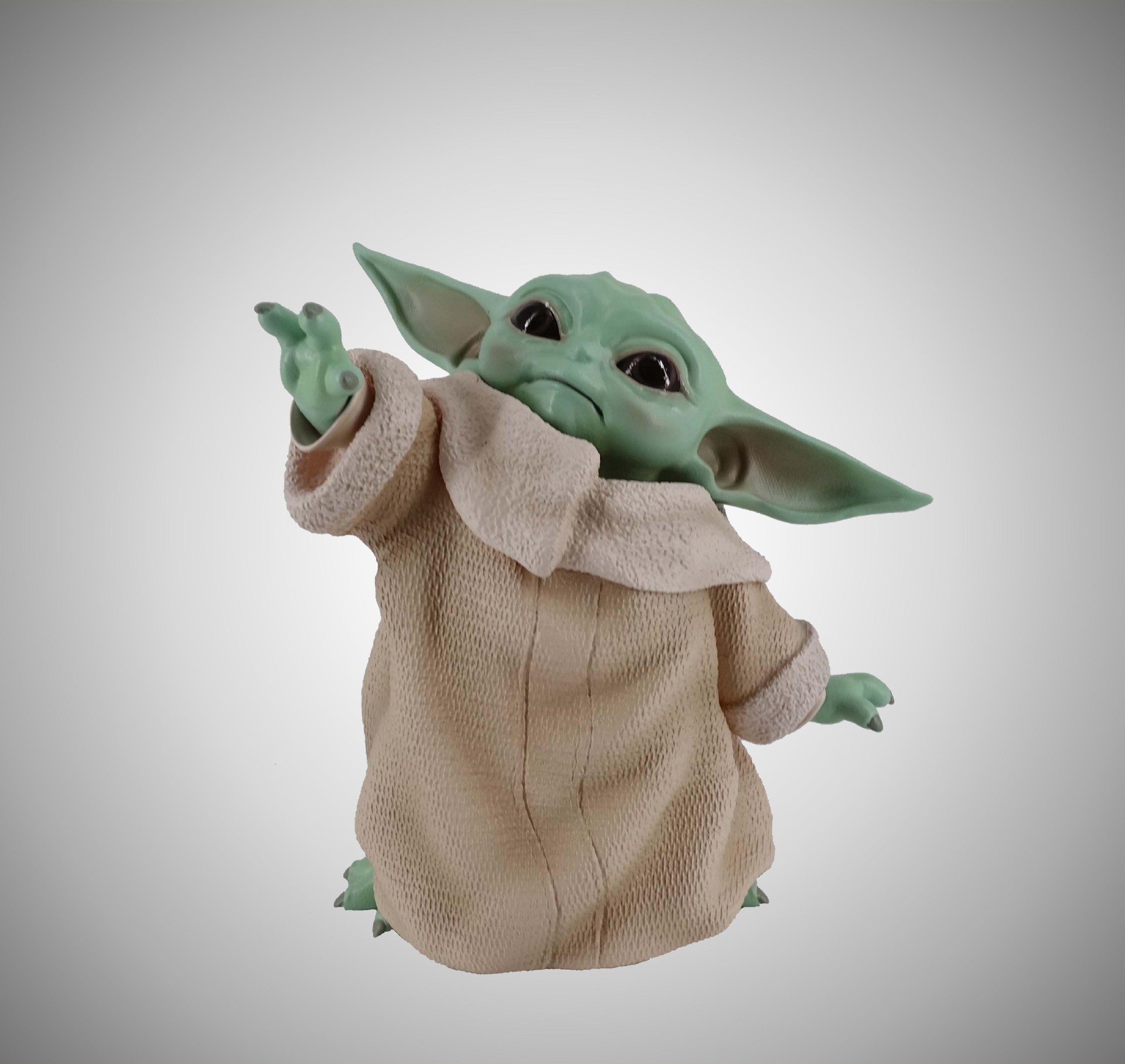 miniature yoda figurine